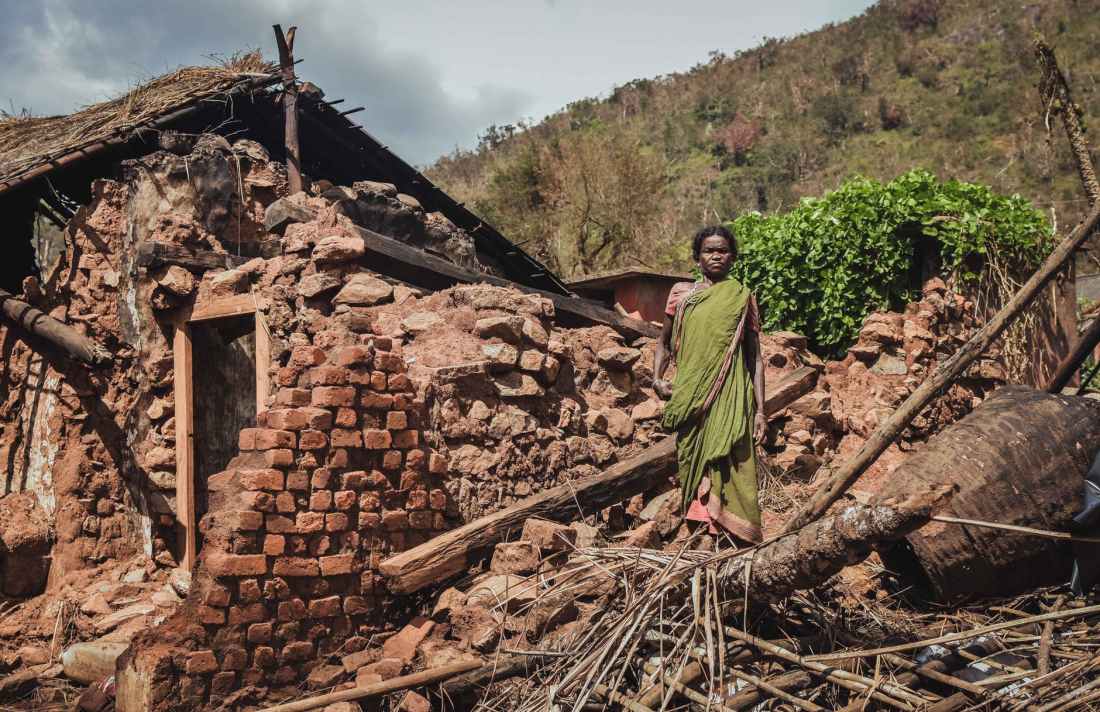 woman standing near house
